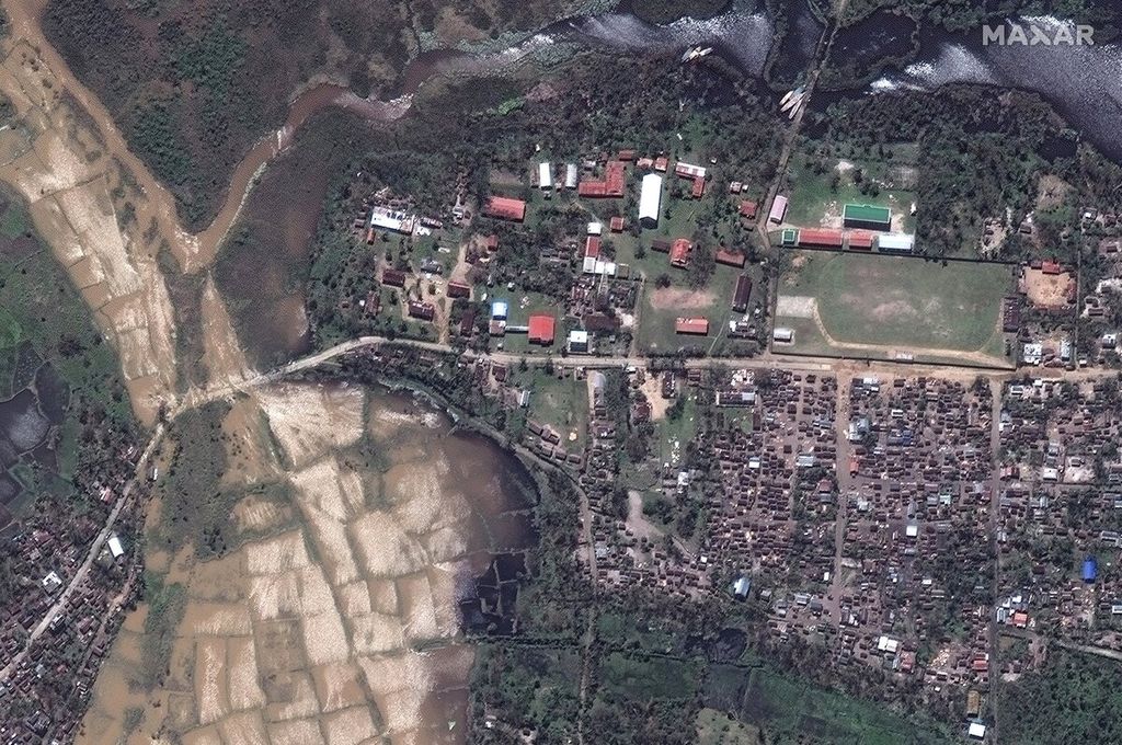 The satellite imagery provided by Maxar Technologies shows the condition of roads, fields, and the main city of Nosy Varika in Madagascar after being hit by flooding from Cyclone Batsirai on Tuesday (7/2/2022).