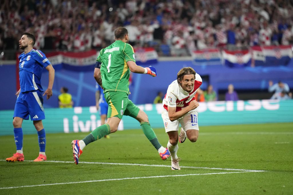 Ekspresi Luka Modric seusai mencetak gol pembuka timnya pada laga Grup B antara Kroasia dan Italia pada Piala Eropa 2024 di Leipzig, Jerman, Senin, 24 Juni 2024. 