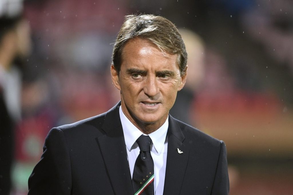 Pelatih asal Italia, Roberto Mancini, membawa Manchester City juara Liga Inggris 2011-2012. 