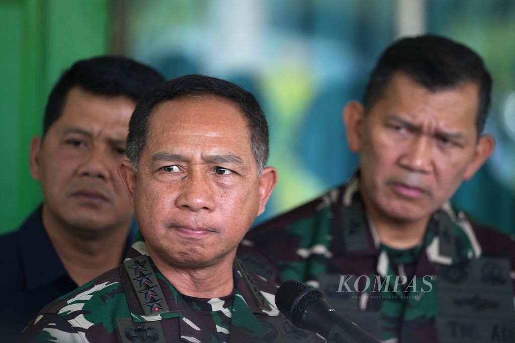 TNI Commander General Agus Subiyanto listens to questions from journalists while inspecting the Gudmurah (Regional Ammunition Warehouse) of Kodam Jaya that caught fire and exploded in Ciangsana Village, Gunung Putri District, Bogor Regency, West Java, on Sunday (March 31, 2024).