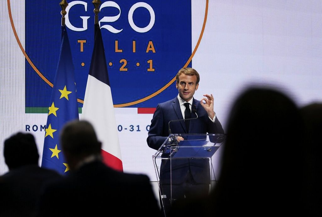 French President Emmanuel Macron speaks during a media conference at the G20 summit in Rome, Sunday, Oct. 31, 2021. The two-day Group of 20 summit concluded on Sunday, the first in-person gathering of leaders of the world's biggest economies since the COVID-19 pandemic started. 