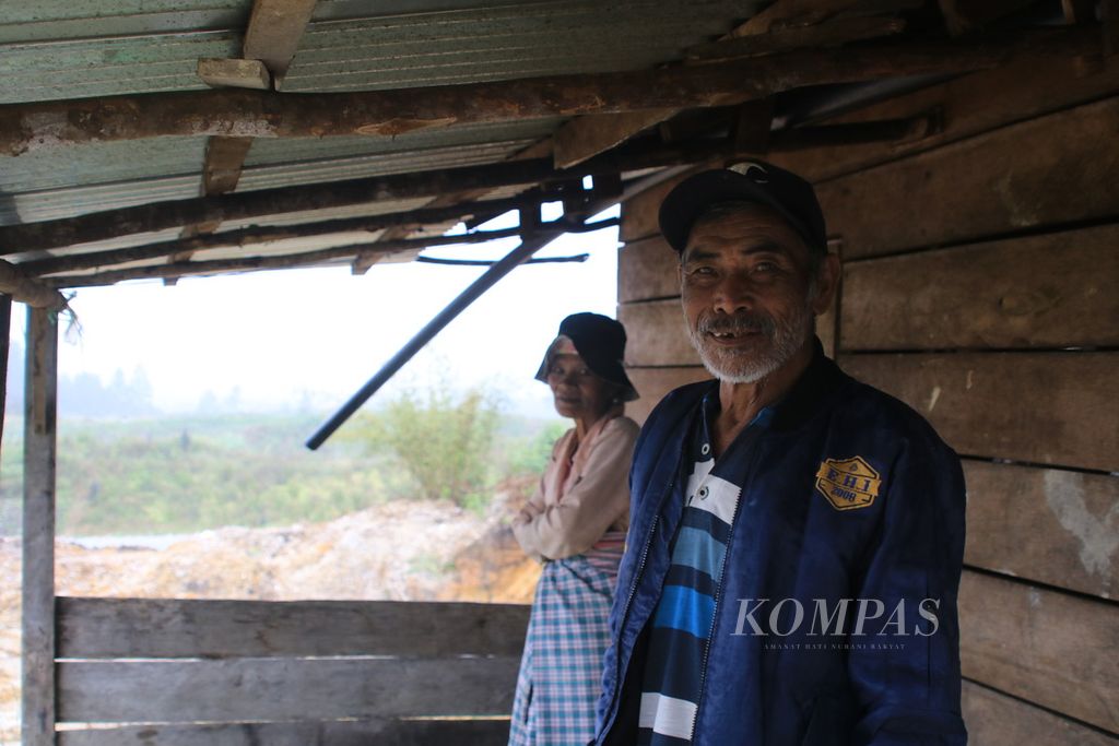 Petani beraktivitas di lahan lumbung pangan Kabupaten Humbang Hasundutan, Sumatera Utara, Kamis (11/1/2024).