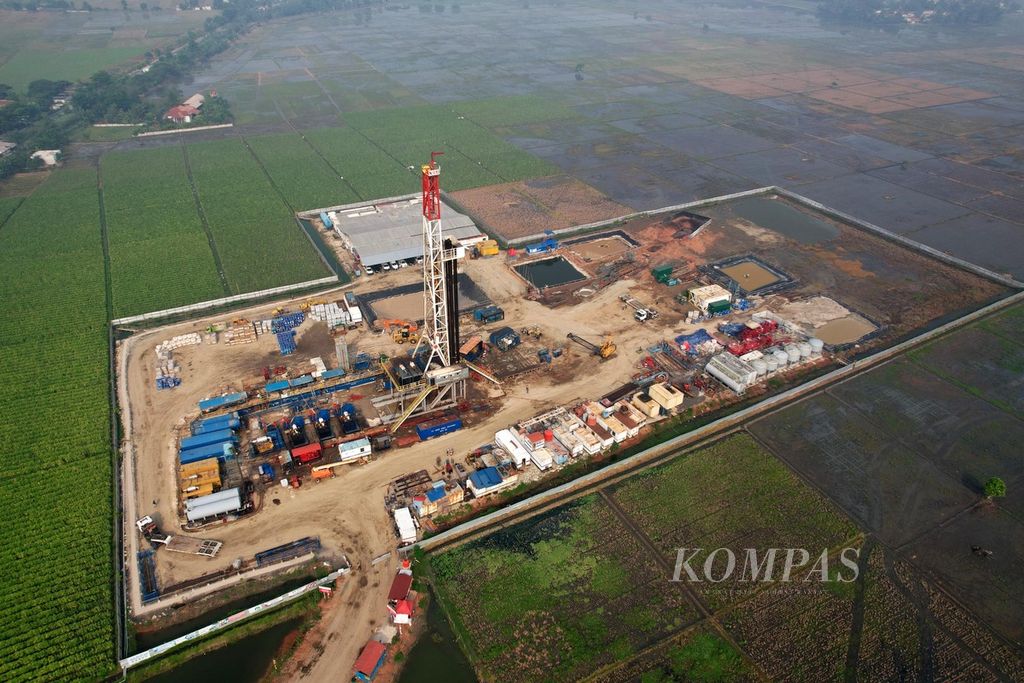 Lanskap kawasaan sumur eksplorasi East Pondok Aren-001 di Desa Sukawijaya, Tambelang, Kabupaten Bekasi, Jawa Barat, Sabtu (23/12/2023). PT Pertamina Hulu Energi baru saja menemukan cadangan minyak bumi di sumur tersebut.  