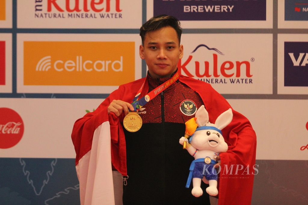 Muhammad Daffa Golden Boy mendapatkan emas pertama untuk seni bela diri wushu pada SEA Games Kamboja 2023 di Phnom Penh, Kamis (11/5/2023). Dari sembilan nomor yang diperlombakan, Indonesia baru meraih satu emas, tiga perak dan satu perunggu.