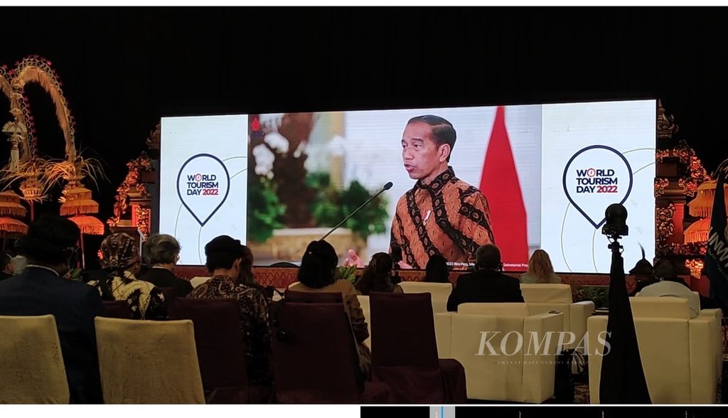 Indonesia menjadi tuan rumah perayaan Hari Pariwisata Sedunia 2022 yang dilangsungkan di Nusa Dua, Badung, Selasa (27/9/2022). Tangkapan layar dari tayangan Presiden Joko Widodo memberikan pesan terkait perayaan Hari Pariwisata Sedunia 2022. 