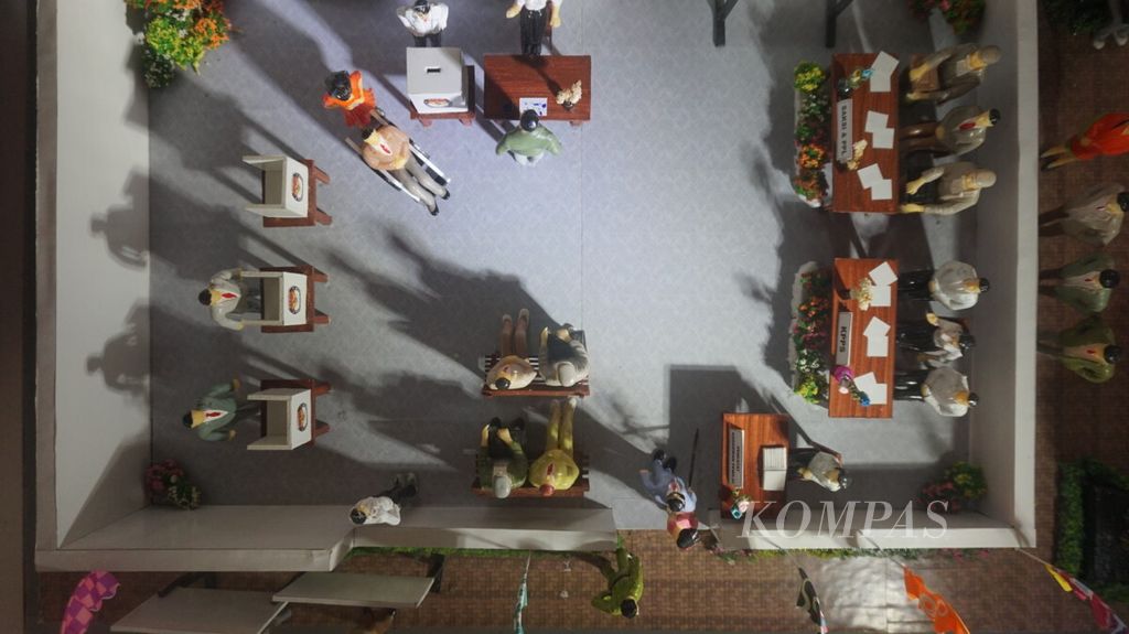 Miniatur diorama simulasi pemungutan suara yang ada di Rumah Pintar Pemilu Punakawan KPU Jatim. Jelang Pemilu 2019, di Jatim masih ditemukan pemilih ganda.