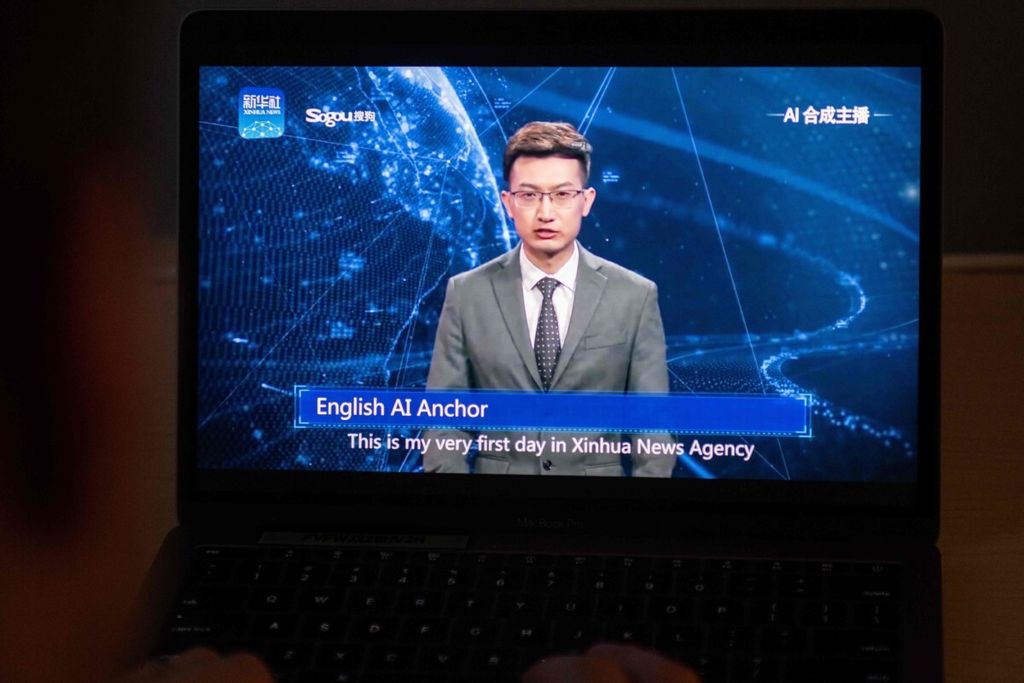 Kantor berita nasional China, Xinhua, mengujicoba penyiar buatan yang diciptakan dengan teknologi kecerdasan buatan (artificial intelligence/AI) pada 9 November 2018.  