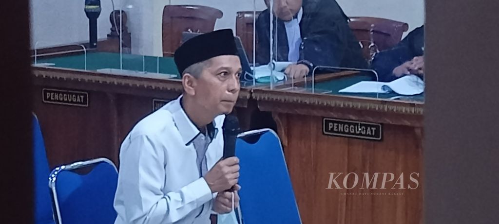 Rektor nonaktif Universitas Lampung Karomani menjalani sidang dakwaan di Pengadilan Tindak Pidana Korupsi pada Pengadilan Negeri Tanjung Karang, Bandar Lampung, Selasa (10/1/2023). 