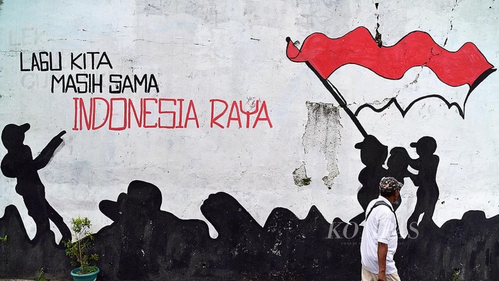 Polarisasi yang terjadi di masyarakat akibat pilkada menggerakkan sekelompok warga untuk mengampanyekan persatuan melalui mural. Salah satunya seperti terlihat di kawasan Cipayung, Tangerang Selatan, Banten, Sabtu (20/1/2018). 