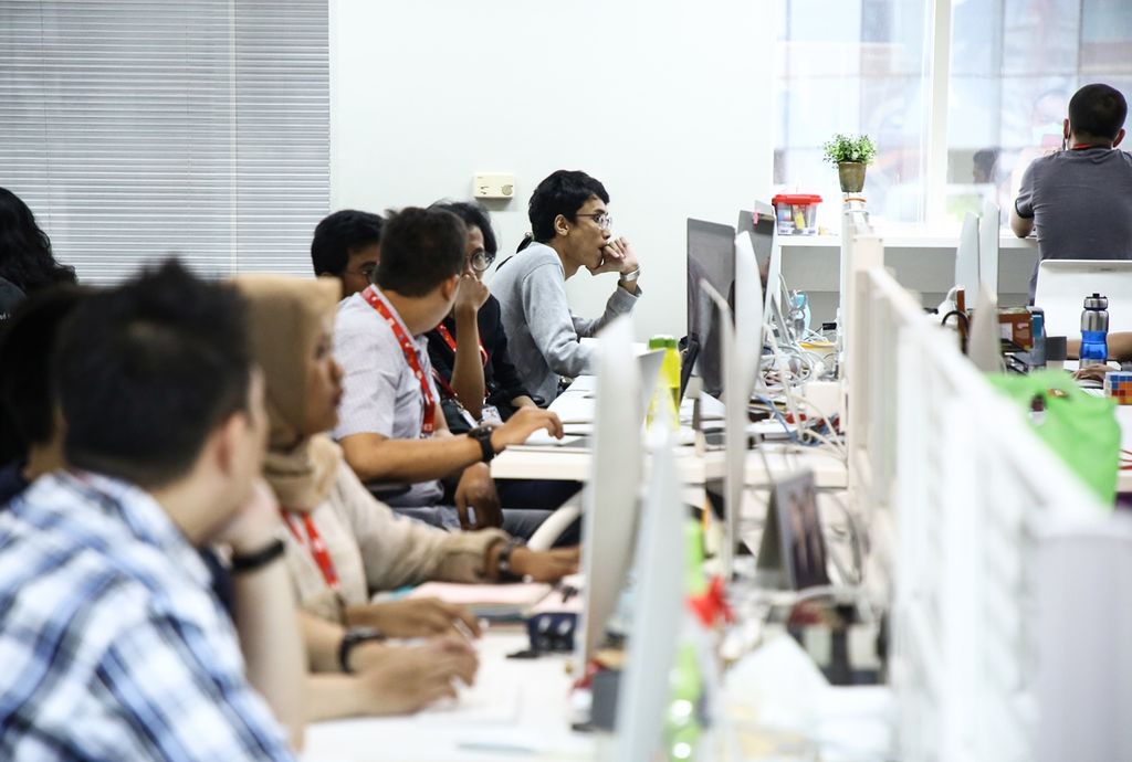 Suasana kerja di kantor perusahaan pembayaran elektronik Doku, di Jakarta, 22 Oktober 2019. Kemajuan teknologi digital menyebabkan disrupsi yang menuntut perusahaan-perusahaan untuk beradaptasi. 