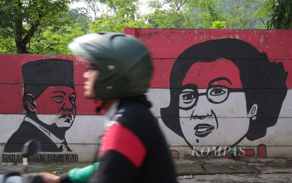 Sosok Presiden ke-5 RI Megawati Soekarnoputri dan Presiden ke-6 RI Susilo Bambang Yudhoyono di sebuah dinding di kawasan Parung, Bogor, Jawa Barat, Kamis (22/6/2023). 