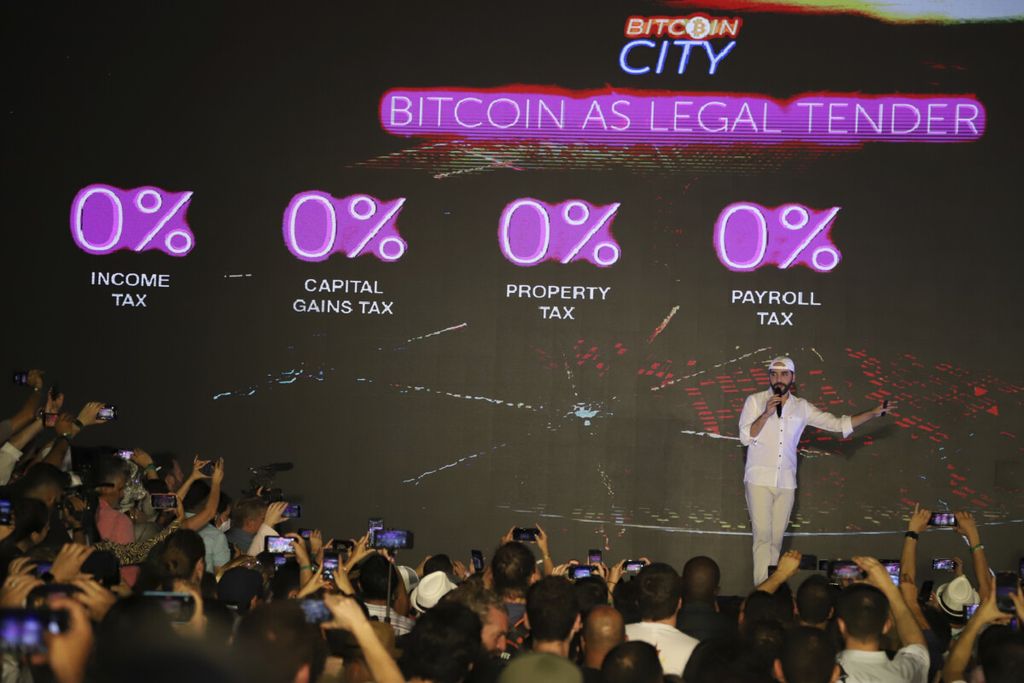 El Salvador\'s President Nayib Bukele participates in the closing ceremony of a congress for cryptocurrency investors in Santa Maria Mizata, El Salvador, Saturday, Nov. 20, 2021. Bukele announced during the rock concert-like atmosphere at the gathering that his government will build an oceanside "Bitcoin City" at the base of a volcano. (AP Photo/Salvador Melendez)
