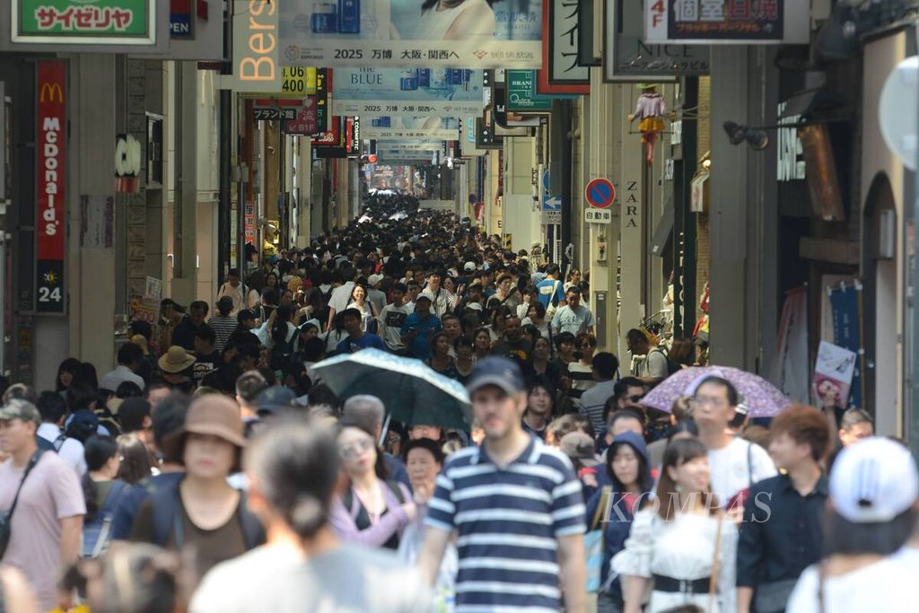 Kawasan Dotonbori di Osaka, Jepang, dikenal sebagai kawasan belanja dan wisata kuliner. 