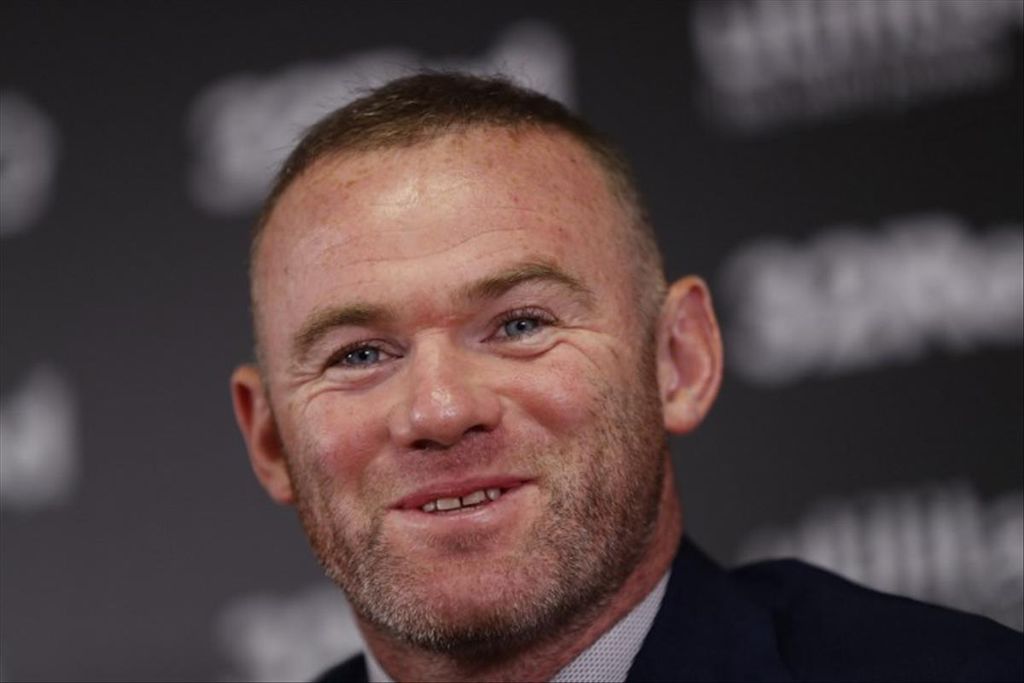 Penyerang DC United dan mantan kapten Inggris Wayne Rooney berbicara dalam konferensi pers di Stadion Pride Park, Derby, Inggris, Selasa (6/8/2019). Ia menandatangani kontrak sebagai pelatih dan pemain Derby County selama 18 bulan.