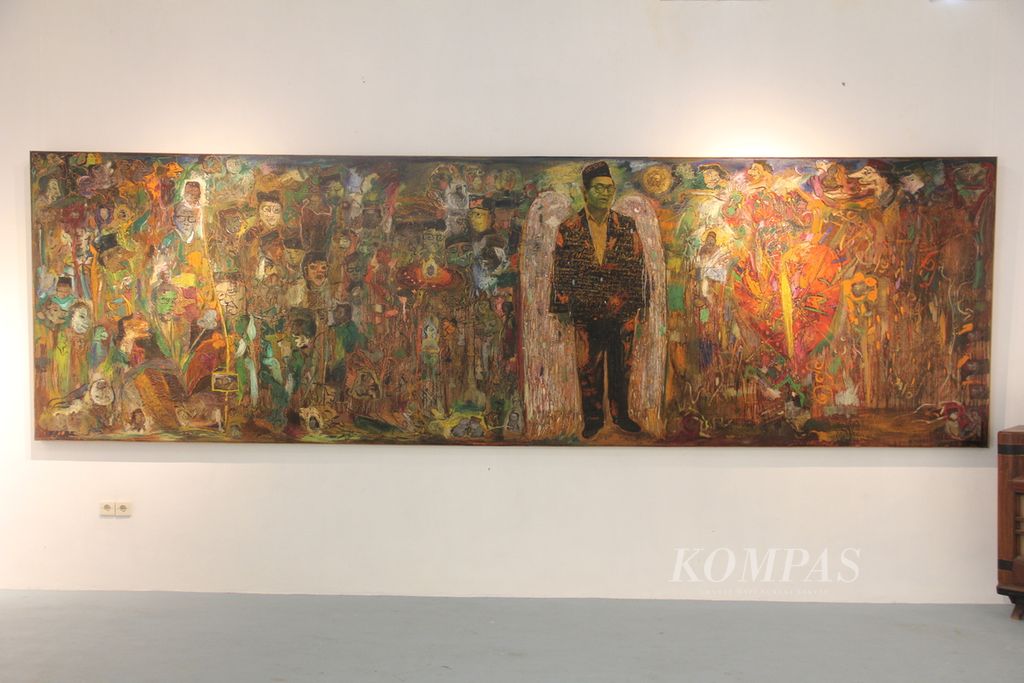 Lukisan berjudul "Satu Juta Satu Hati untuk Gus Dur" karya perupa Nasirun ditampilkan dalam pameran yang bertajuk "Anak-anak Semar" di Galeri Yakopan, kompleks Omah Petroek, Desa Hargobinangun, Kecamatan Pakem, Kabupaten Sleman, Daerah Istimewa Yogyakarta, Minggu (15/5/2022). 