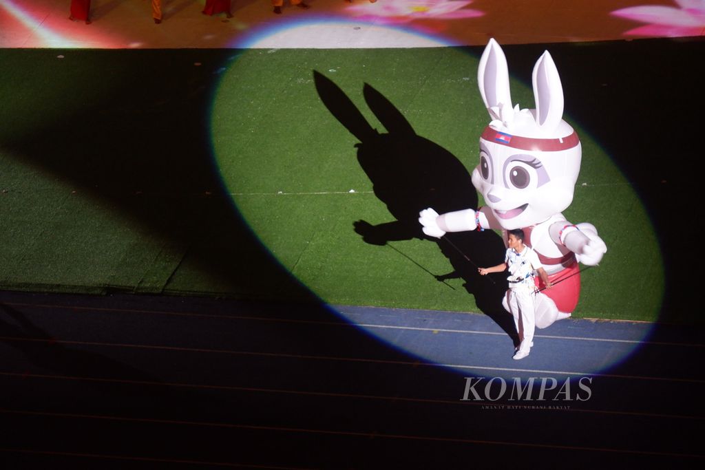 A performer introduces the official SEA Games Cambodia mascot, Rumdul, at the opening ceremony of the 2023 SEA Games Cambodia at Morodok Techo Stadium, Phnom Penh, Cambodia 2023.