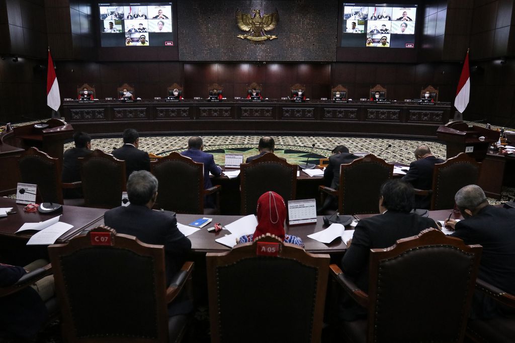 Suasana sidang pleno uji materi Undang-Undang Pemilu di Gedung Mahkamah Konstitusi, Jakarta, Kamis (26/1/2023). Mahkamah Konstitusi (MK) menggelar sidang pleno uji materi Undang-Undang Pemilu terkait sistem pemilihan legislatif proporsional terbuka. 