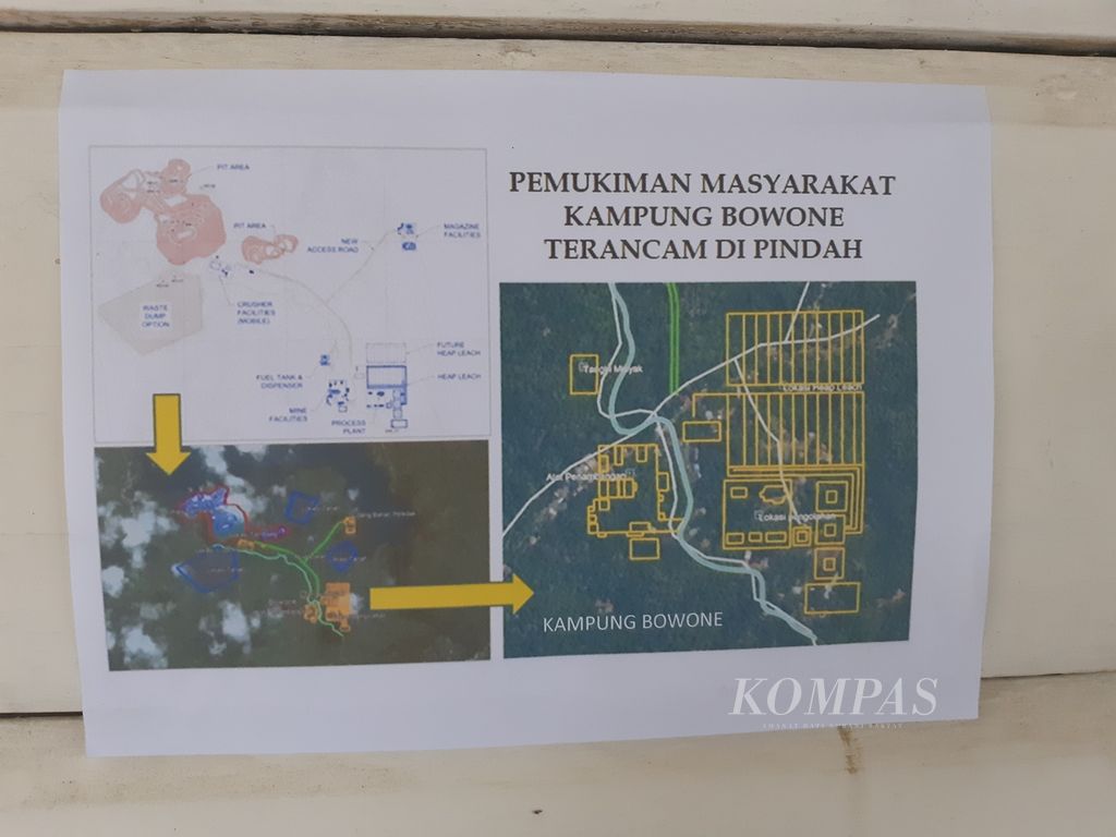 Pamflet berisi perkiraan lokasi pusat pengolahan bijih emas PT Tambang Mas Sangihe dipasang di dinding rumah warga Kampung Bowone, Tabukan Selatan Tengah,  Kepulauan Sangihe, Sulawesi Utara, Minggu (8/8/2021). Warga Kampung Bowone khawatir mereka akan tergusur jika perusahaan mulai beroperasi.