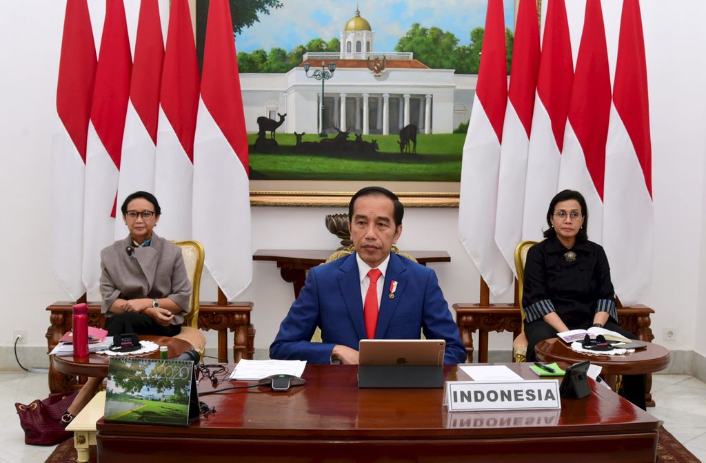 Presiden Joko Widodo mengikuti KTT Luar Biasa G20 secara virtual dari Istana Kepresidenan Bogor, Kamis (26/3/2020). KTT tersebut membahas upaya negara-negara anggota G20 dalam penanganan Covid-19.