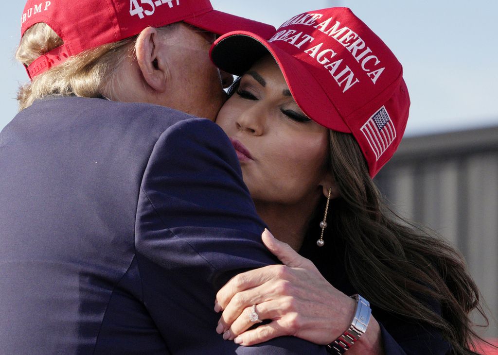 Former US President Donald Trump and South Dakota Governor Kristi Noem (right) at a campaign rally in Ohio in March 2024.