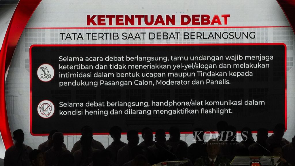 Layar menampilkan tata tertib dalam Debat Calon Presiden Pemilu 2024 Putaran Ketiga di Istora Senayan, Kompleks Gelora Bung Karno, Jakarta, Minggu (7/1/2024). 