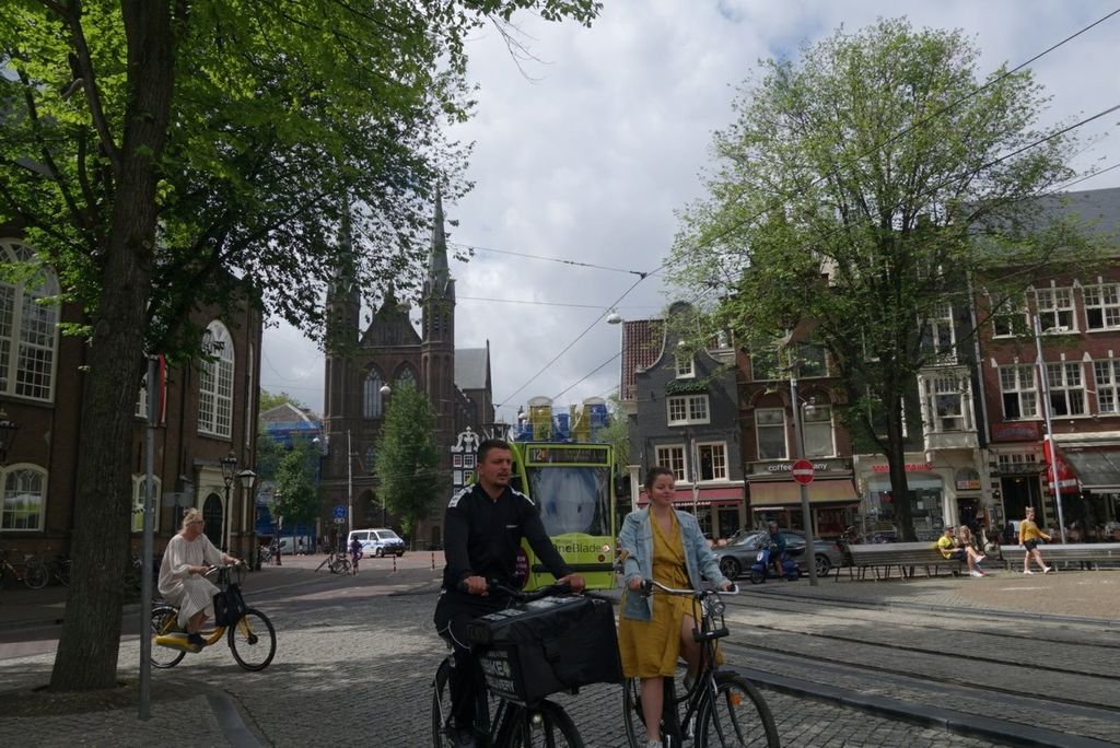 Suasana salah satu sudut Kota Amsterdam, Belanda, yang dijuluki ibu kota sepeda dunia. Foto diambil pada 1 Juli 2019.